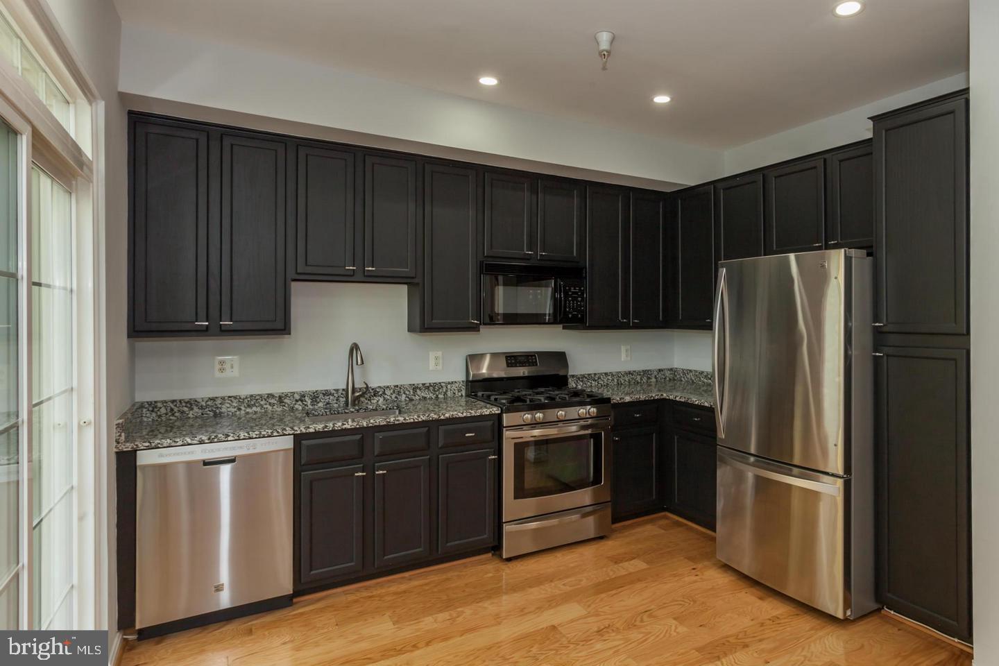 Renovated Kitchen with Granite and SS Appliances