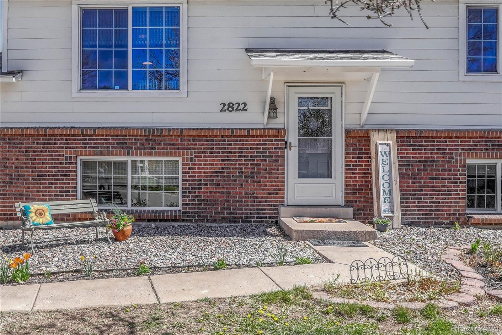 a front view of a house with outdoor shower