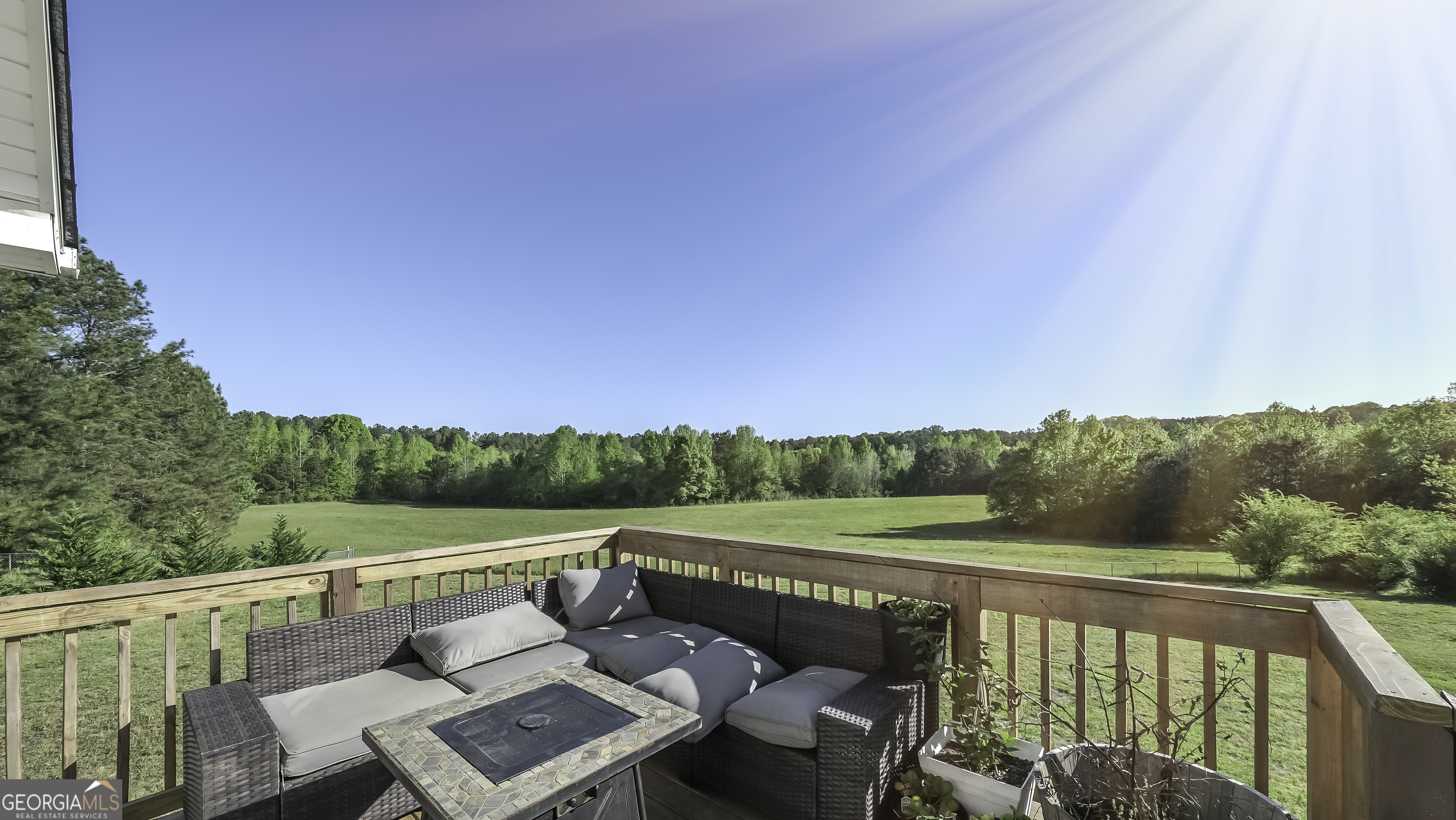 505 Miranda Way Temple, GA 30179 - Photo 7 of 33 a view of a balcony with mountain view and wooden floor