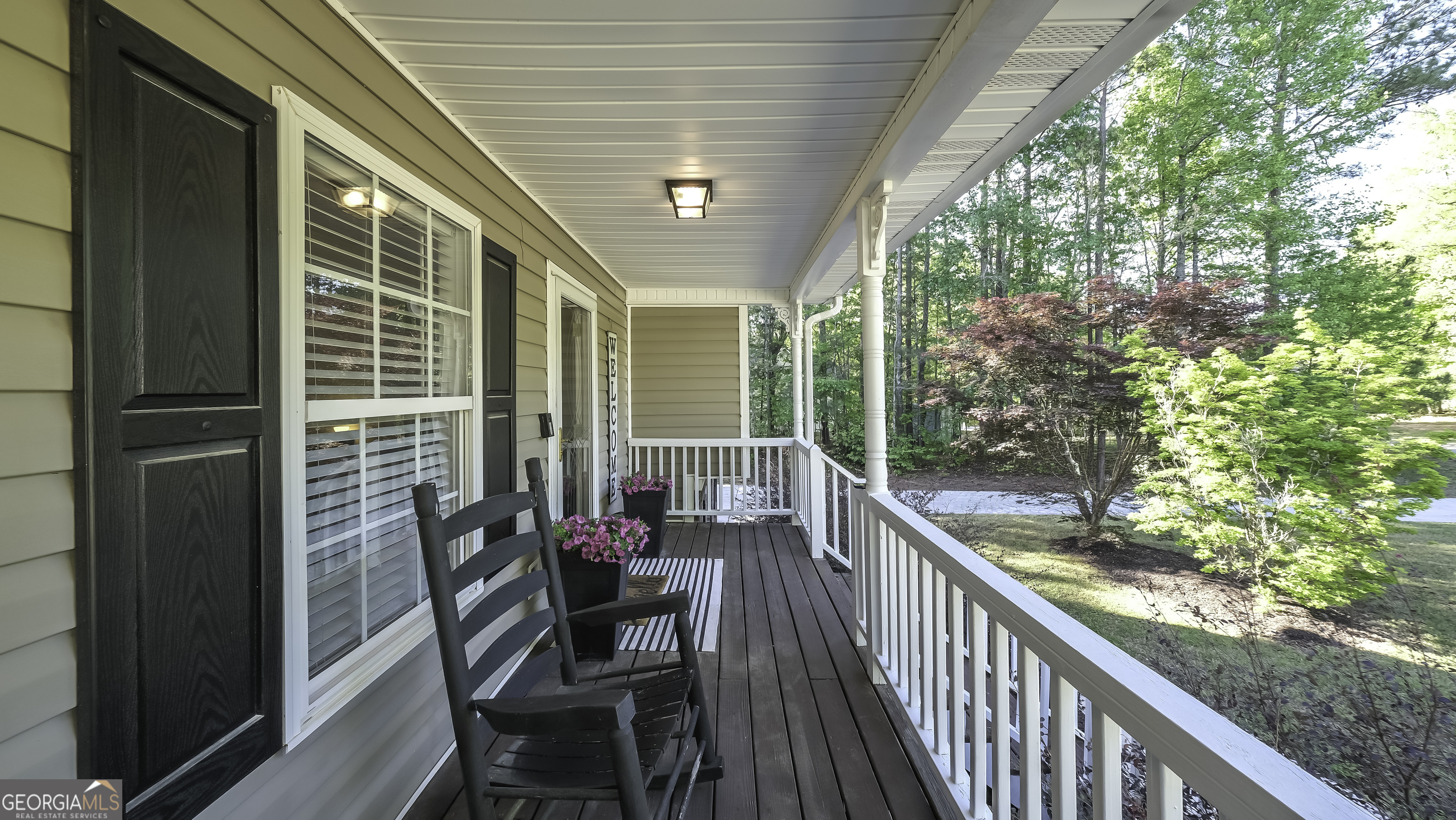 505 Miranda Way Temple, GA 30179 - Photo 8 of 33 a view of a porch with furniture and wooden floor