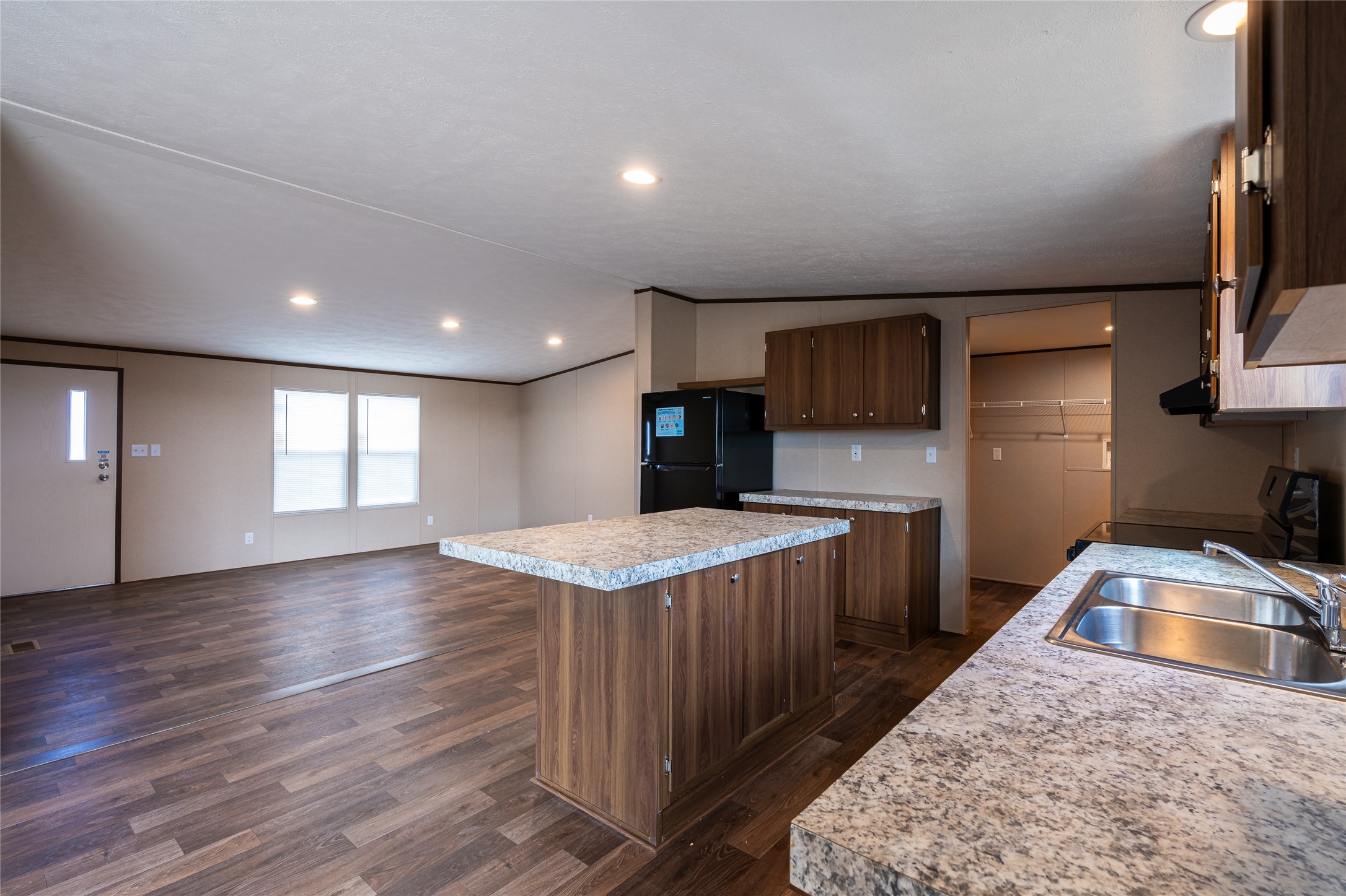 6965 Seawillow Road Lockhart, TX 78644 - Photo 6 of 18 kitchen to the living room