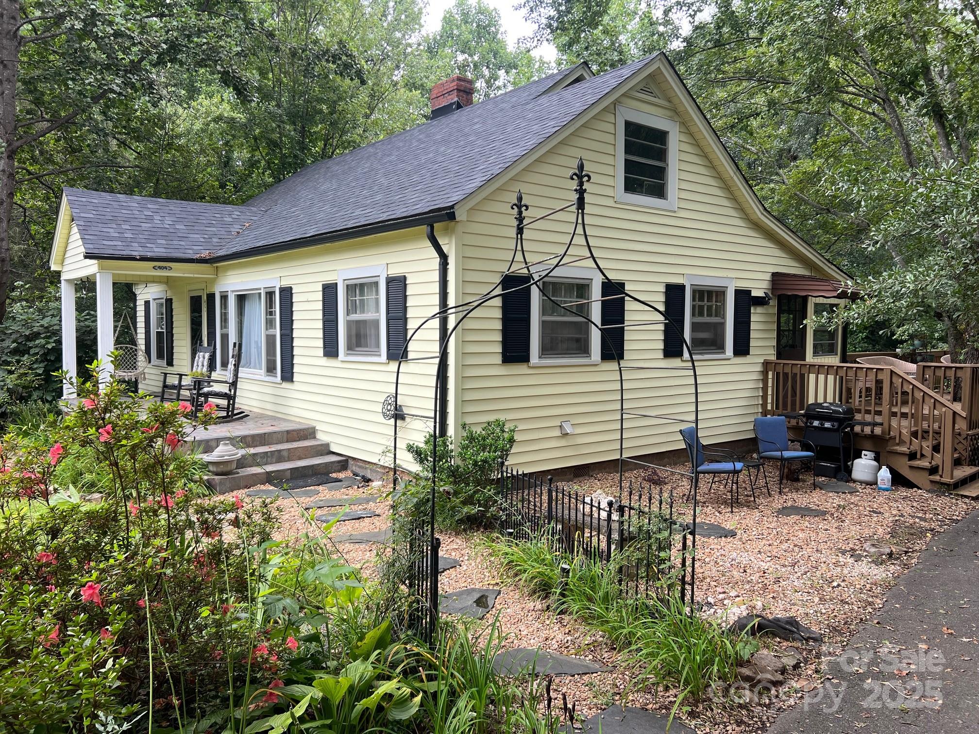 404 Patton Street Morganton, NC 28655 - Photo 2 of 40 a view of a house with a yard
