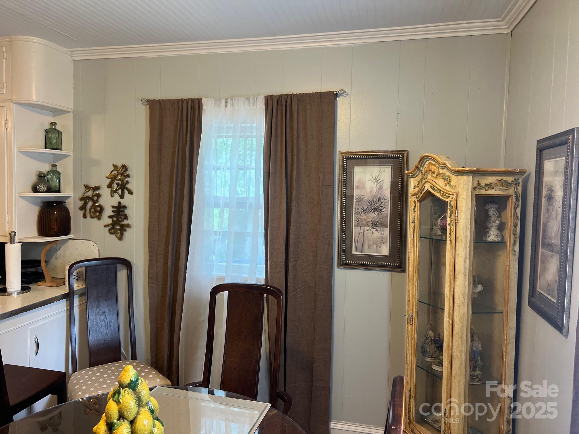 404 Patton Street Morganton, NC 28655 - Photo 21 of 40 a view of walk in closet with furniture and wooden floor