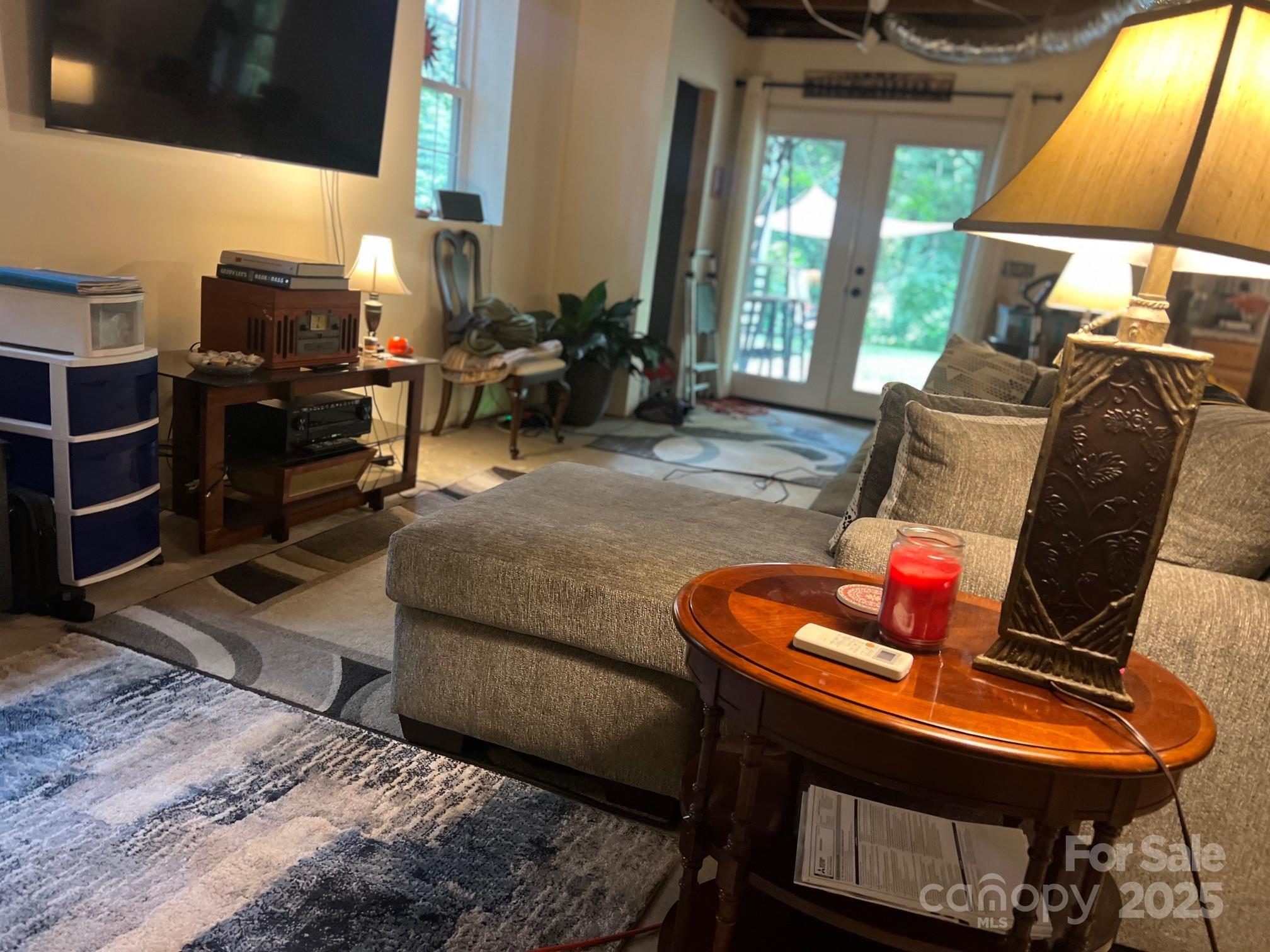 404 Patton Street Morganton, NC 28655 - Photo 35 of 40 a living room with furniture and a flat screen tv