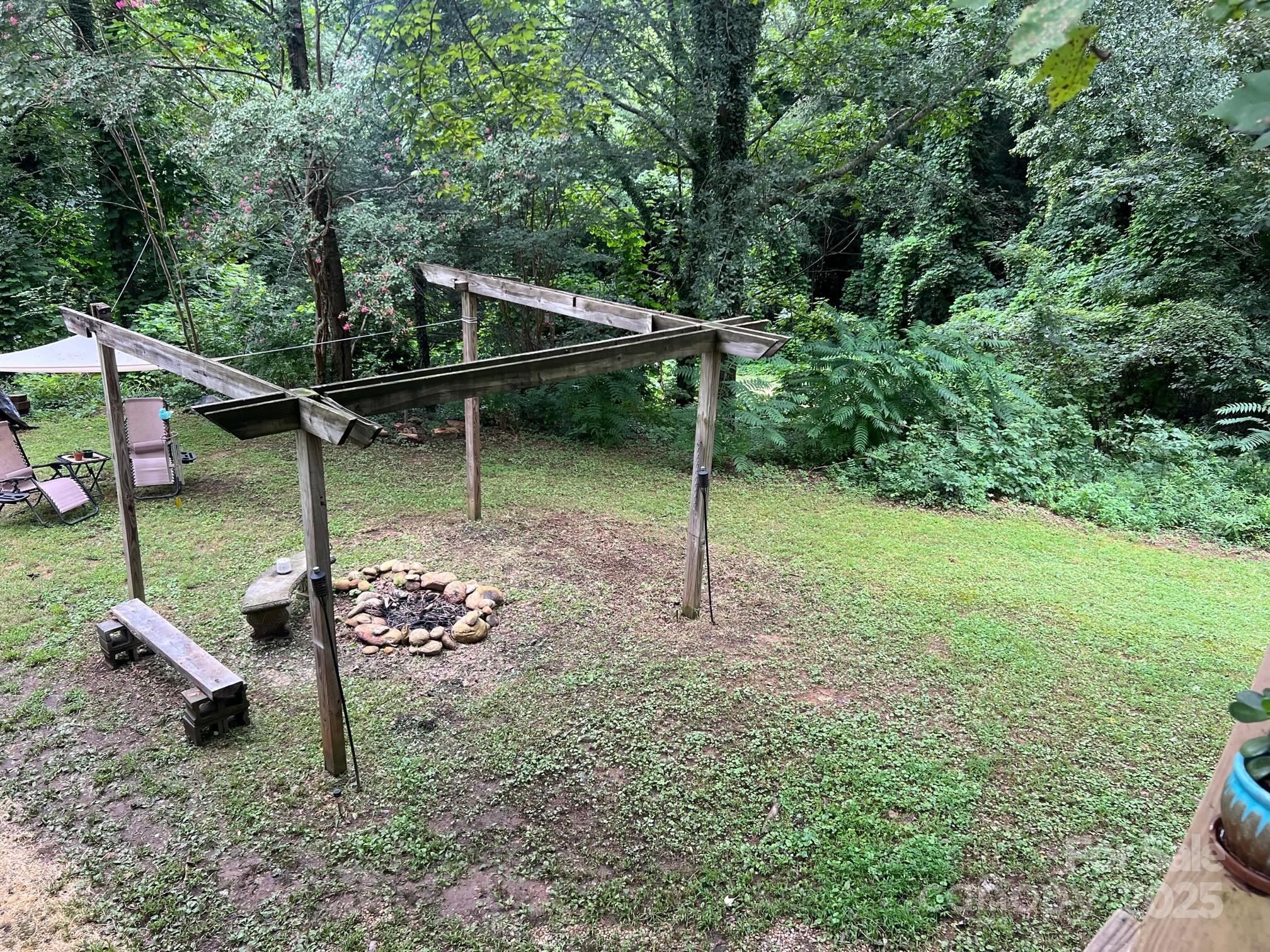 404 Patton Street Morganton, NC 28655 - Photo 39 of 40 a backyard of a house with lots of green space