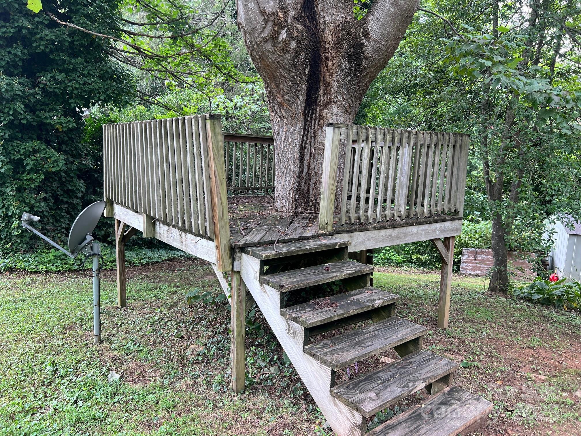 404 Patton Street Morganton, NC 28655 - Photo 7 of 40 a view of a backyard with a bench