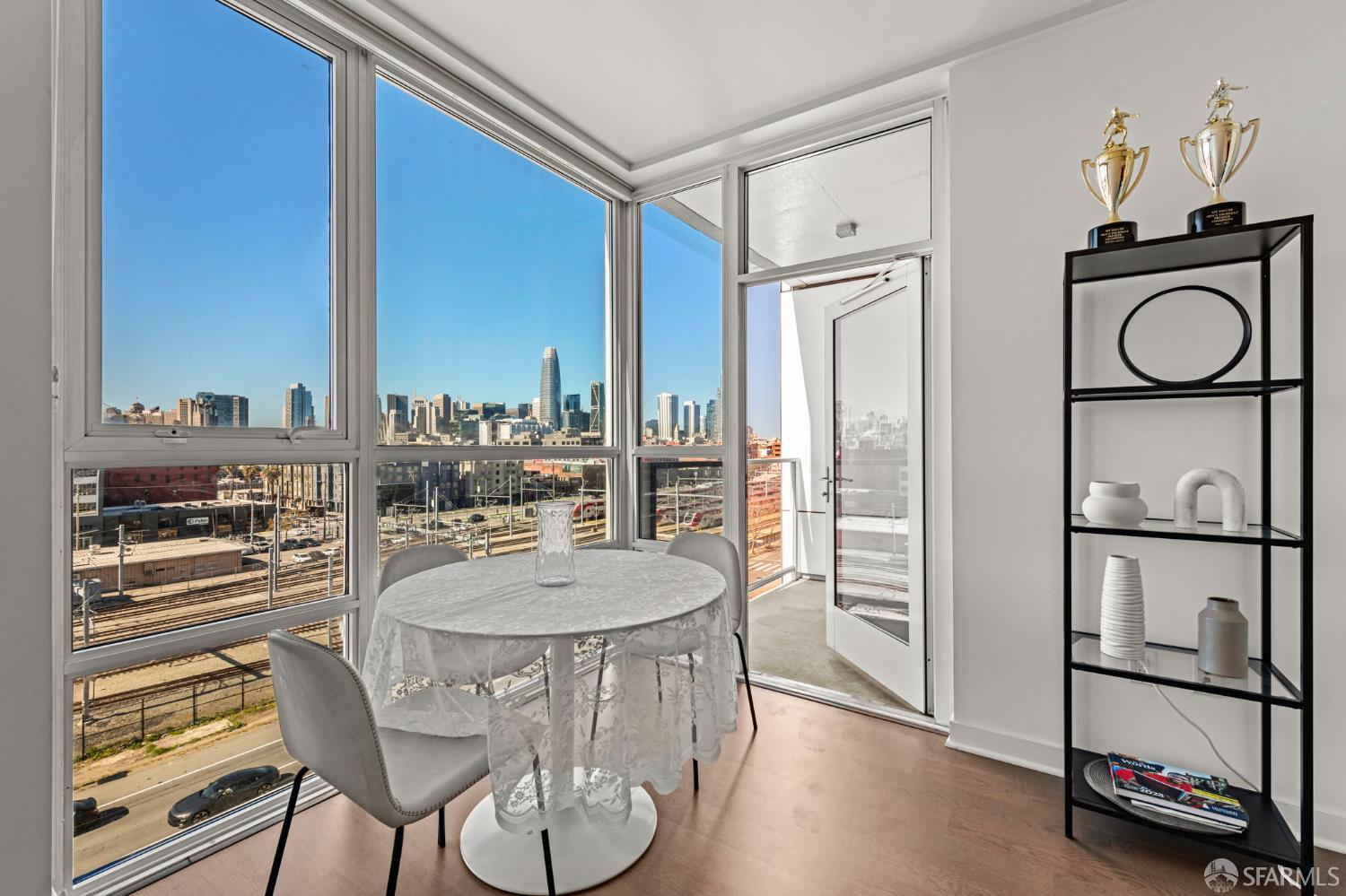 300 Berry Street, Unit 721 San Francisco, CA 94158 - Photo 11 of 27 a view of a dining room with furniture window and wooden floor