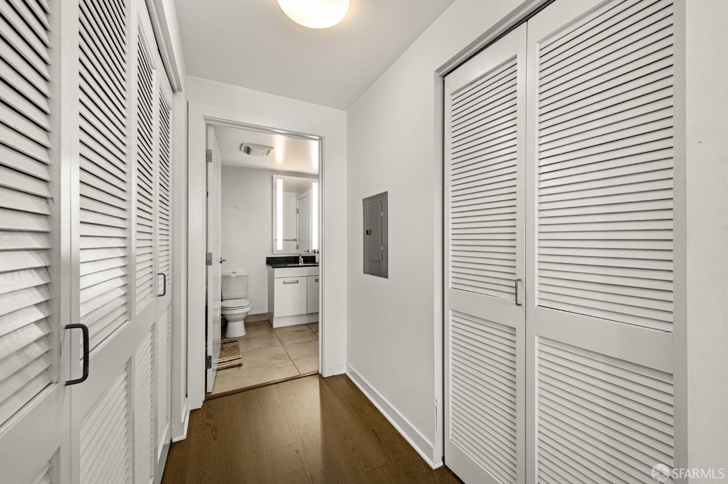 300 Berry Street, Unit 721 San Francisco, CA 94158 - Photo 18 of 27 a view of a hallway with a dining room and stairs