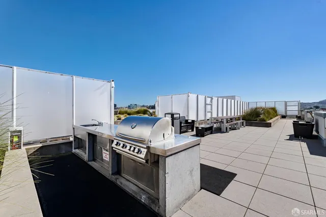 a view of a chairs and table in a terrace