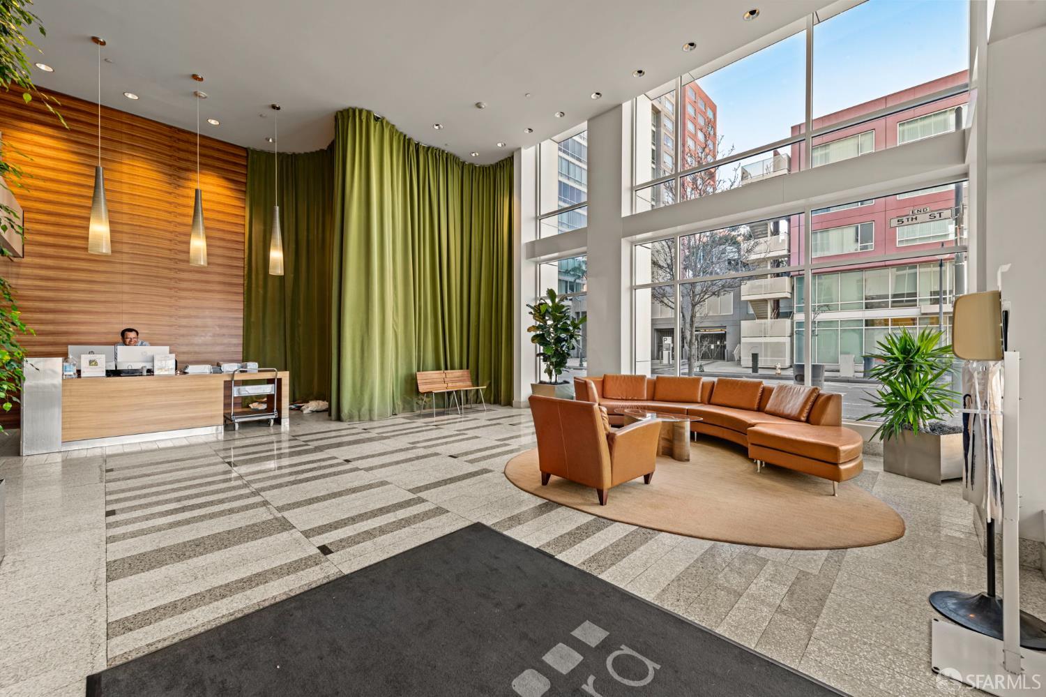 300 Berry Street, Unit 721 San Francisco, CA 94158 - Photo 4 of 27 a living room with furniture and large windows