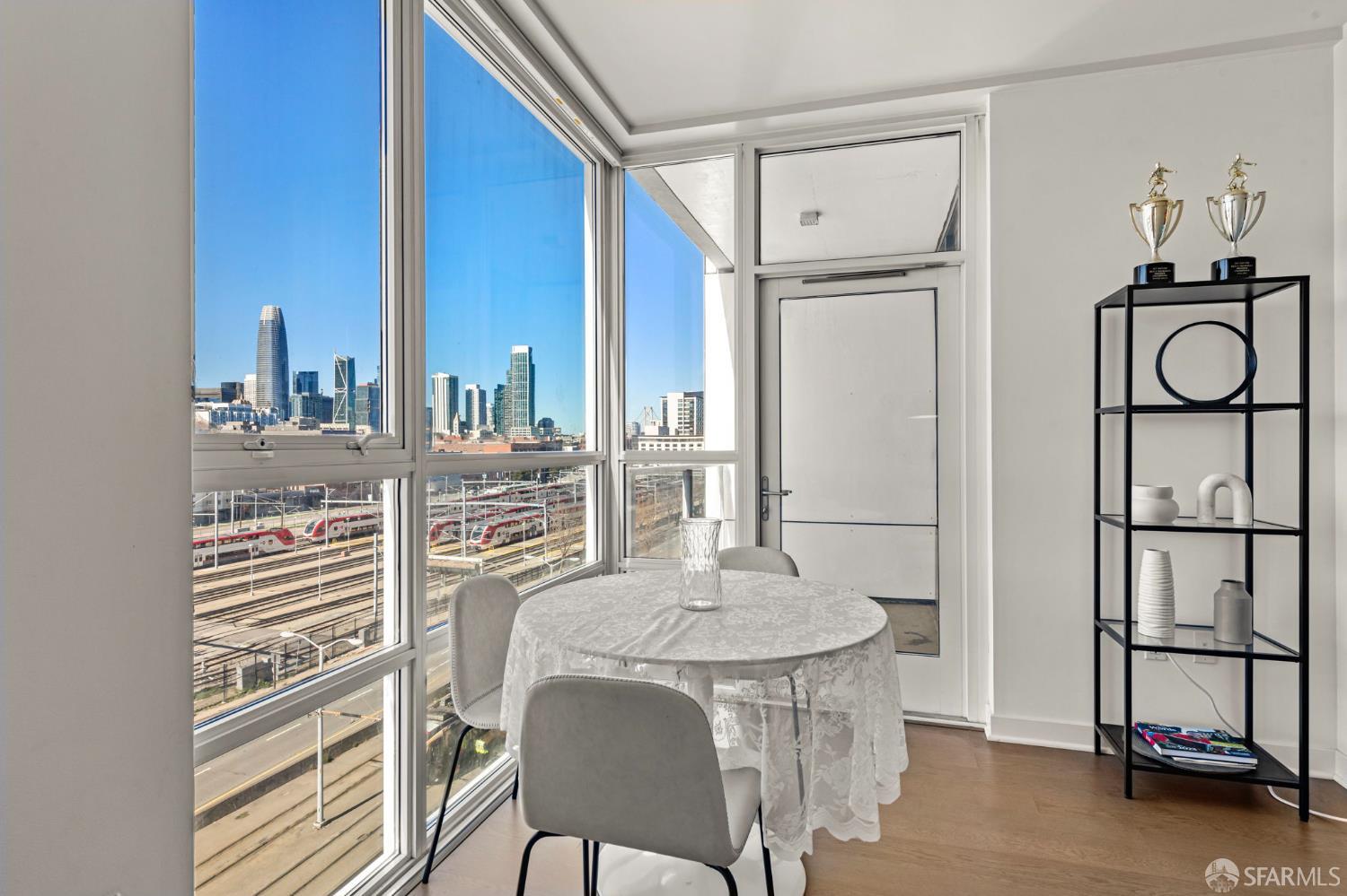 300 Berry Street, Unit 721 San Francisco, CA 94158 - Photo 10 of 27 a view of a dining room with furniture and a window