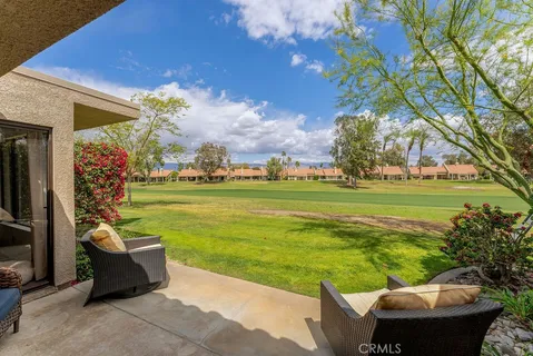 a view of a kitchen with a sink and dishwasher wooden floor