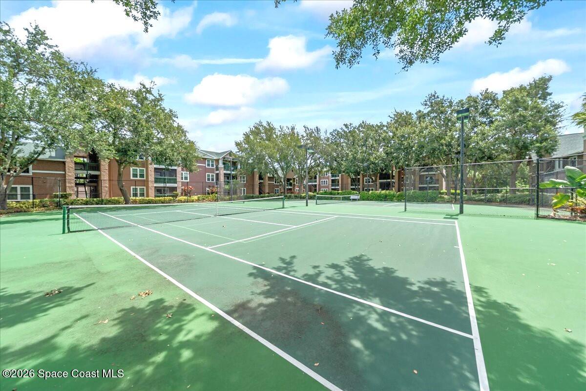 7667 North Wickham Road, Unit 102 Melbourne, FL 32940 - Photo 10 of 15 a view of a basketball court