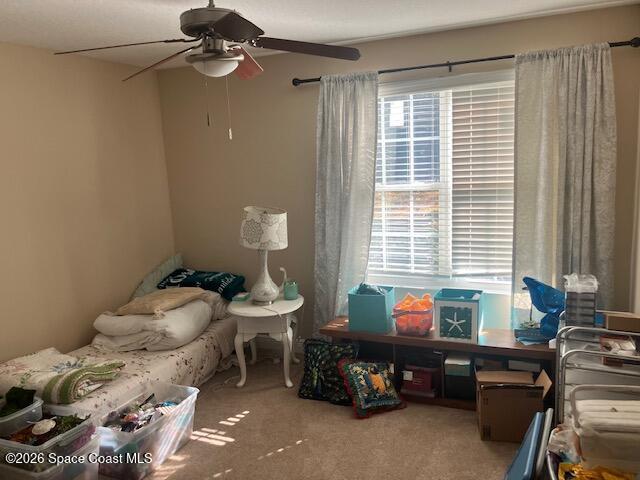 7667 North Wickham Road, Unit 102 Melbourne, FL 32940 - Photo 6 of 15 a room with furniture and a window