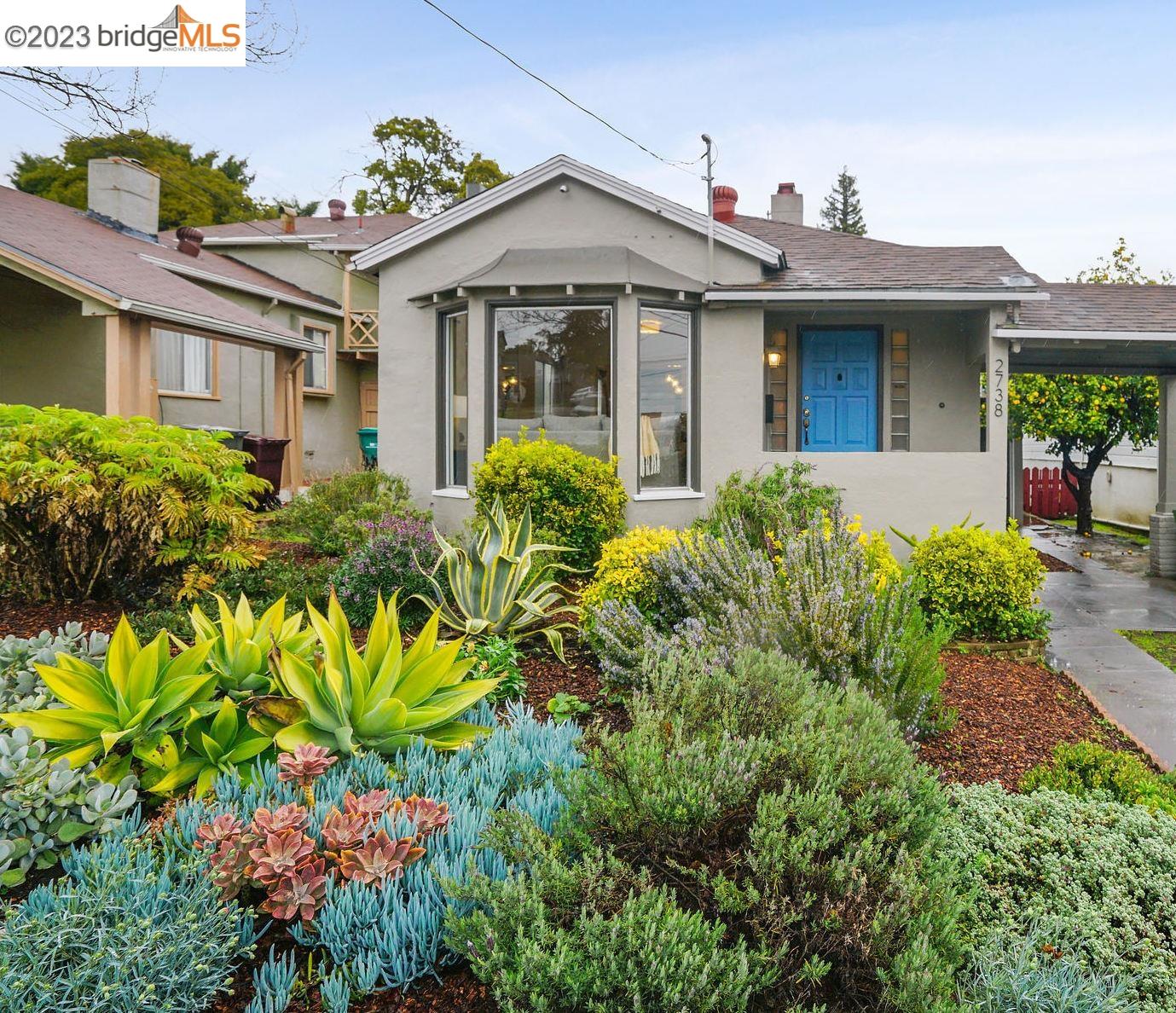 2738 23rd Avenue Oakland, CA 94606 - Photo 1 of 1 front view of a house with a yard