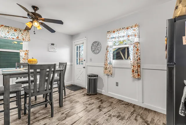 a view of a dining room with furniture