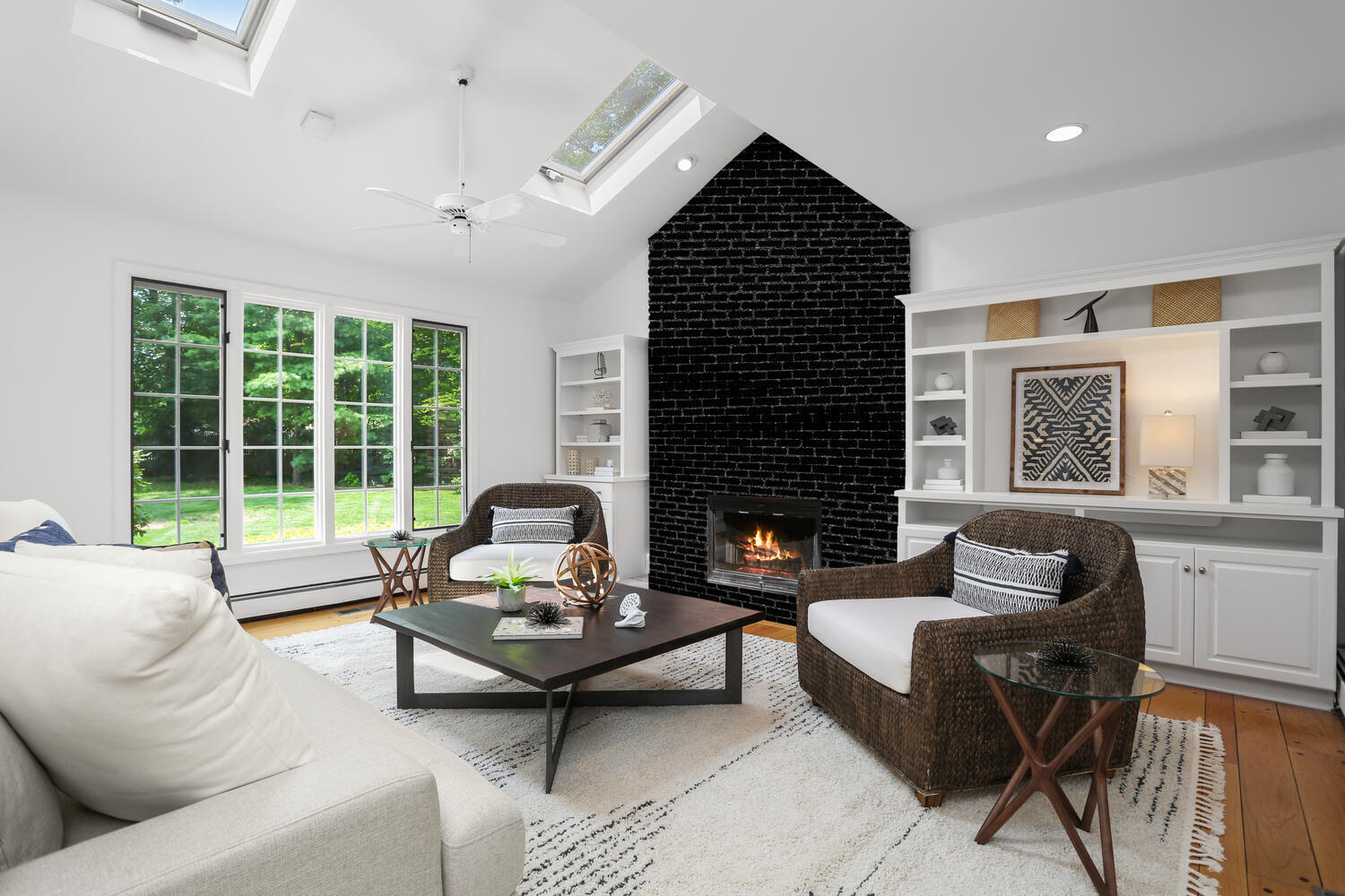 18 Rings End Road Darien, CT 06820 - Photo 22 of 40 a living room with furniture and a fireplace