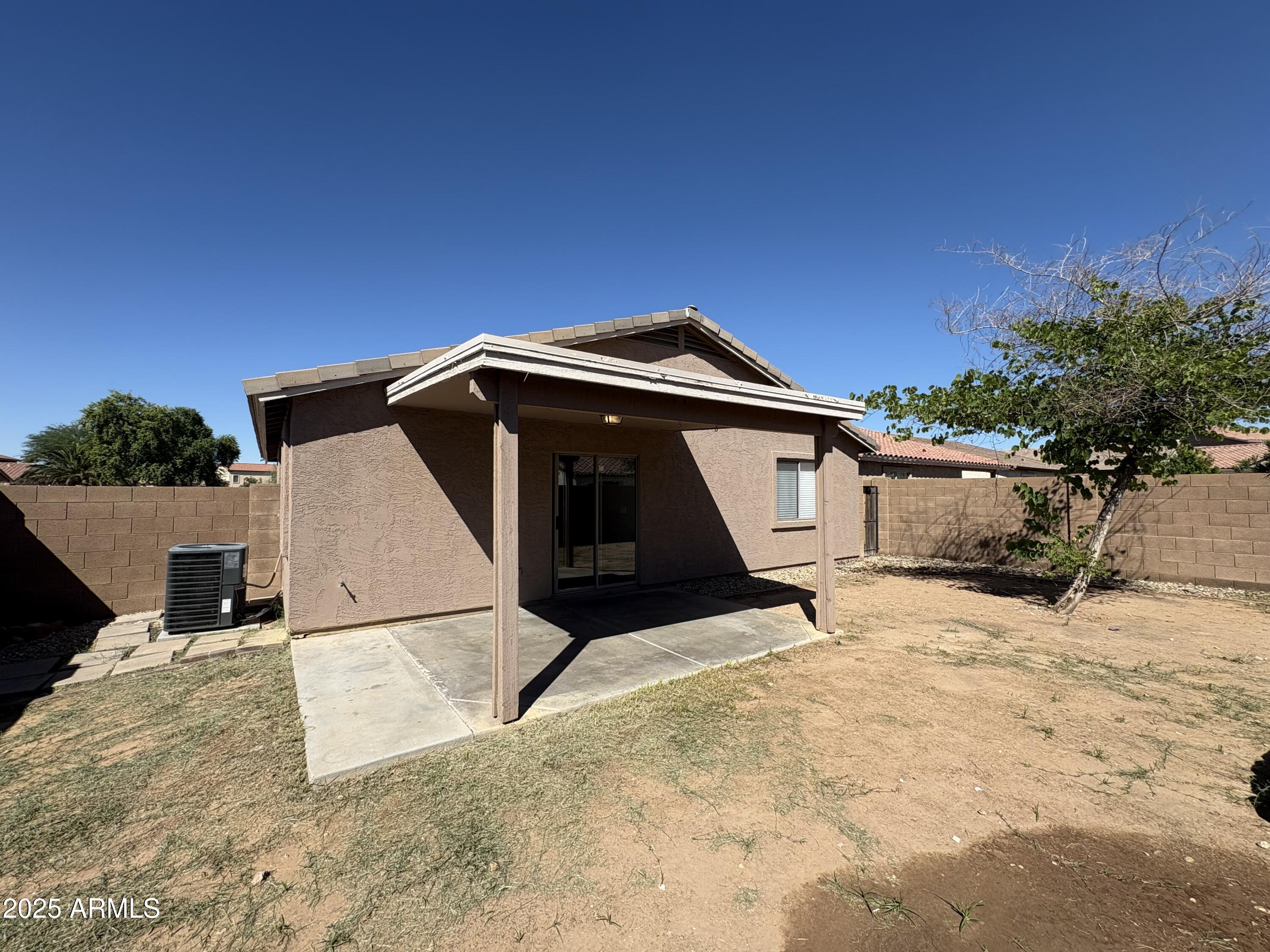 3323 South 80th Avenue Phoenix, AZ 85043 - Photo 7 of 7 a house with trees in the background