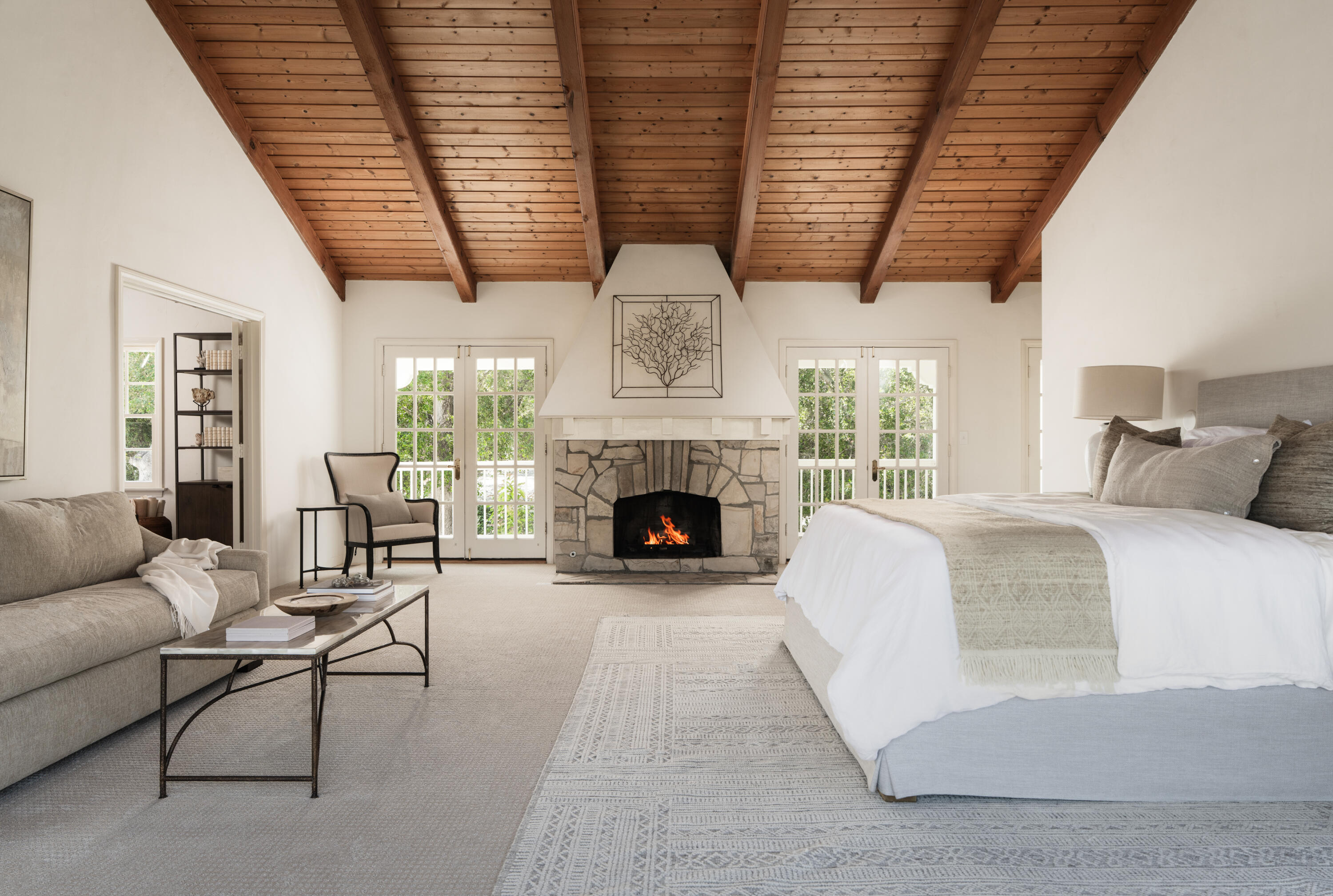 939 Arcady Road Santa Barbara, CA 93108 - Photo 16 of 28 a living room with furniture a fireplace and a large window