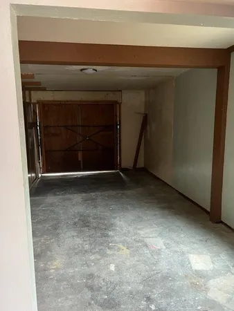a view of balcony with wooden floor