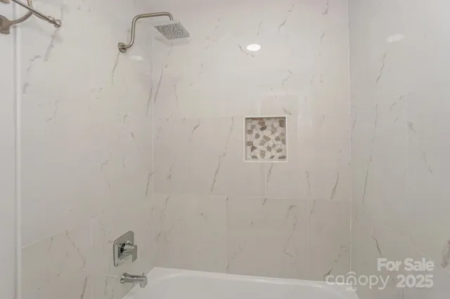 a bathroom with a bathtub