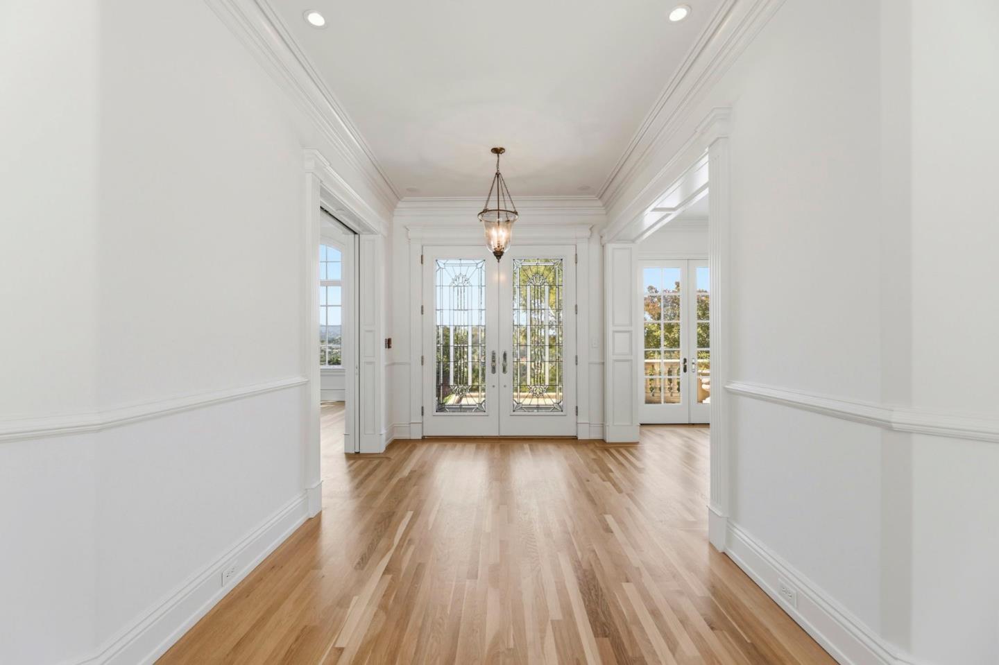 14113 Pike Road Saratoga, CA 95070 - Photo 9 of 78 a view of an empty room with wooden floor and a window