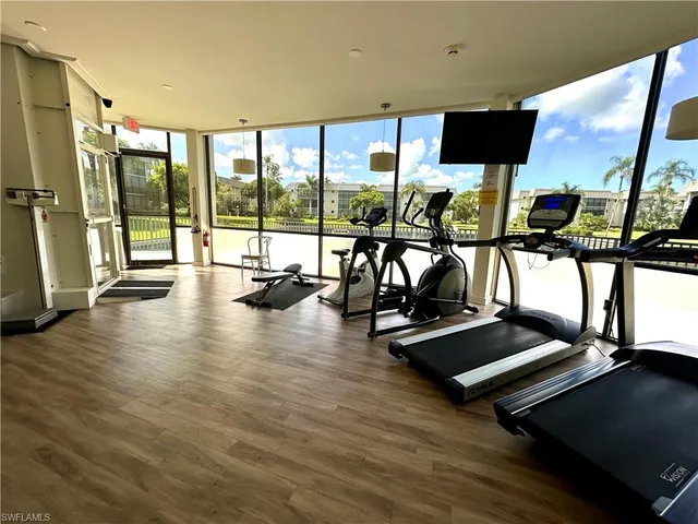 a view of a room with gym equipment
