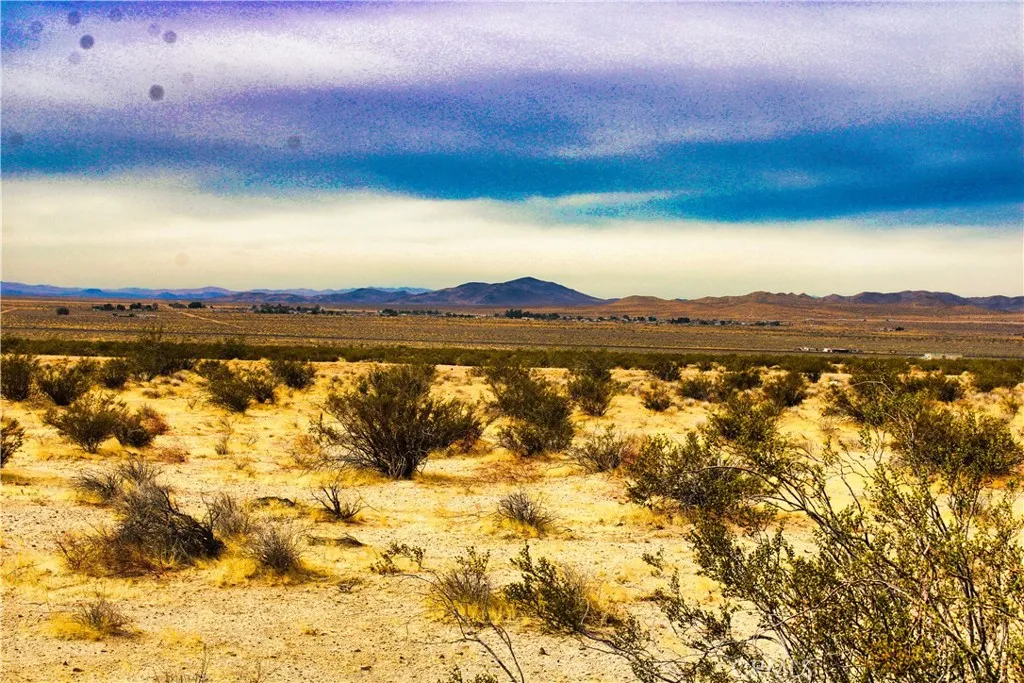 777 Valley Wells Road Hinkley, CA 92347 - Photo 30 of 50 a view of lake and sunset