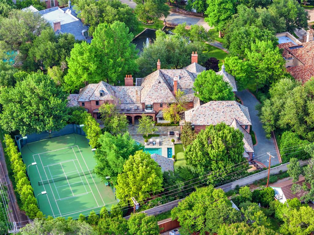 17 Robledo Drive Dallas, TX 75230 - Photo 1 of 40 an aerial view of a house with swimming pool and garden