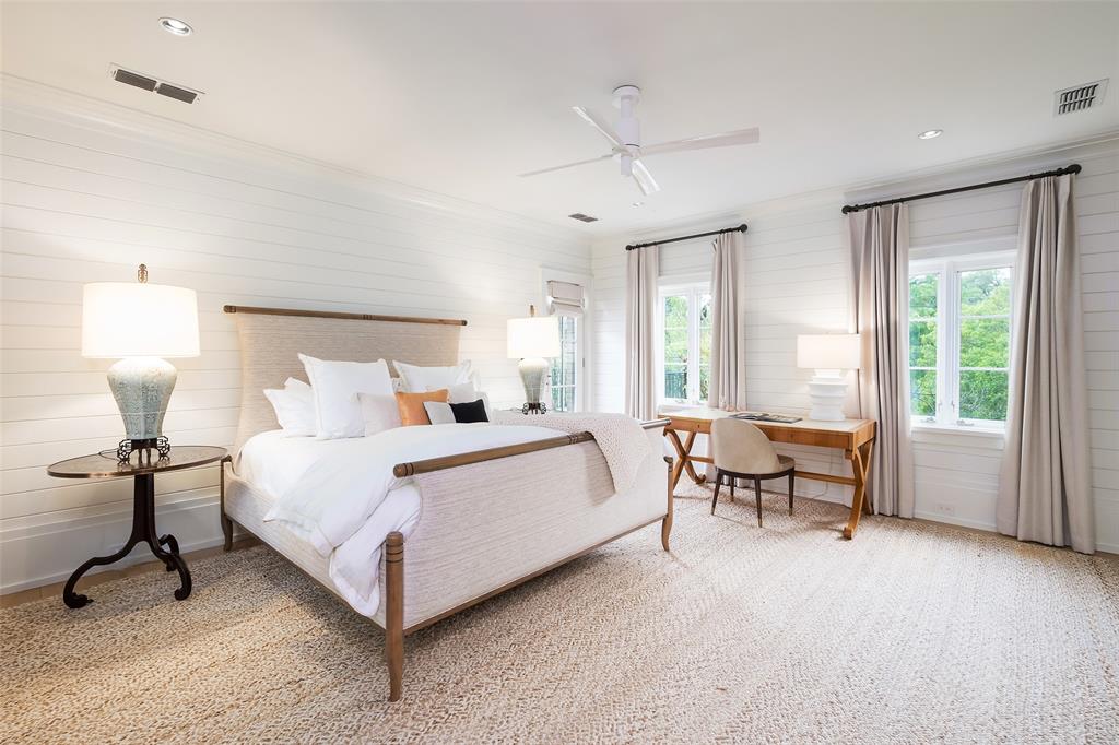 17 Robledo Drive Dallas, TX 75230 - Photo 24 of 40 a bedroom with a bed and a table