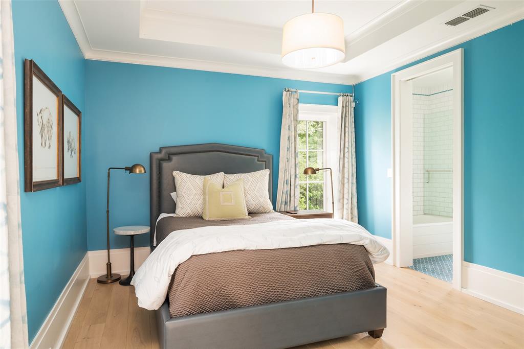 17 Robledo Drive Dallas, TX 75230 - Photo 26 of 40 a bedroom with a bed and a window