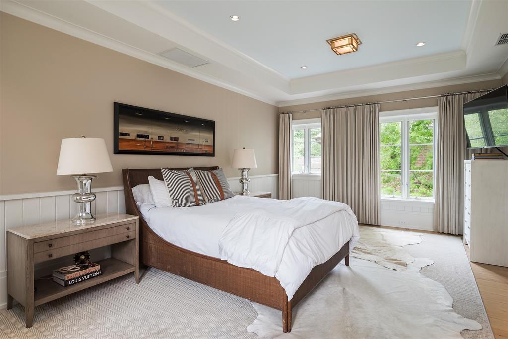 17 Robledo Drive Dallas, TX 75230 - Photo 30 of 40 a bedroom with a bed and a night stand