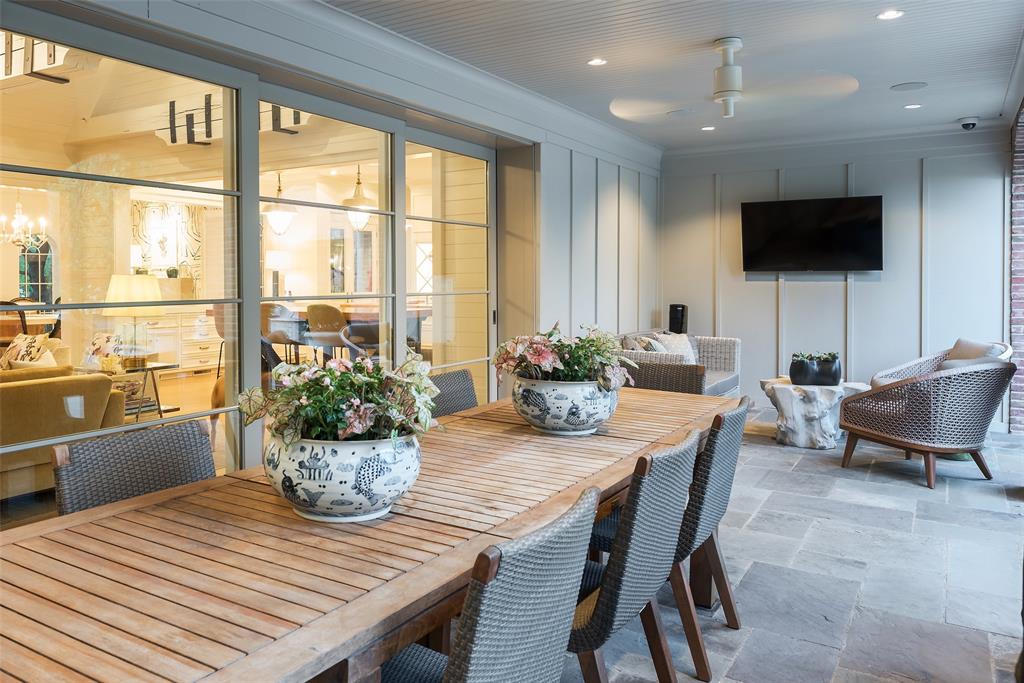 17 Robledo Drive Dallas, TX 75230 - Photo 35 of 40 a view of a dining room with furniture window and wooden floor