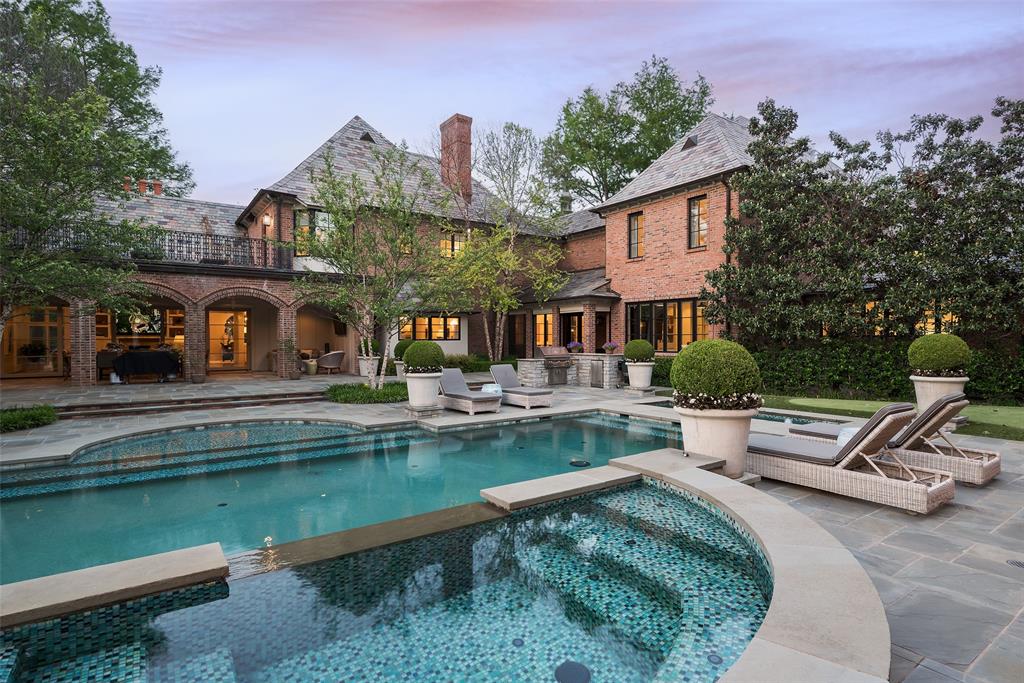 17 Robledo Drive Dallas, TX 75230 - Photo 37 of 40 a view of house with swimming pool and chair