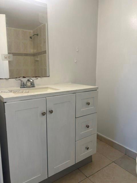 666 West 81st Street, Unit 103 Hialeah, FL 33014 - Photo 7 of 12 a bathroom with a sink and mirror
