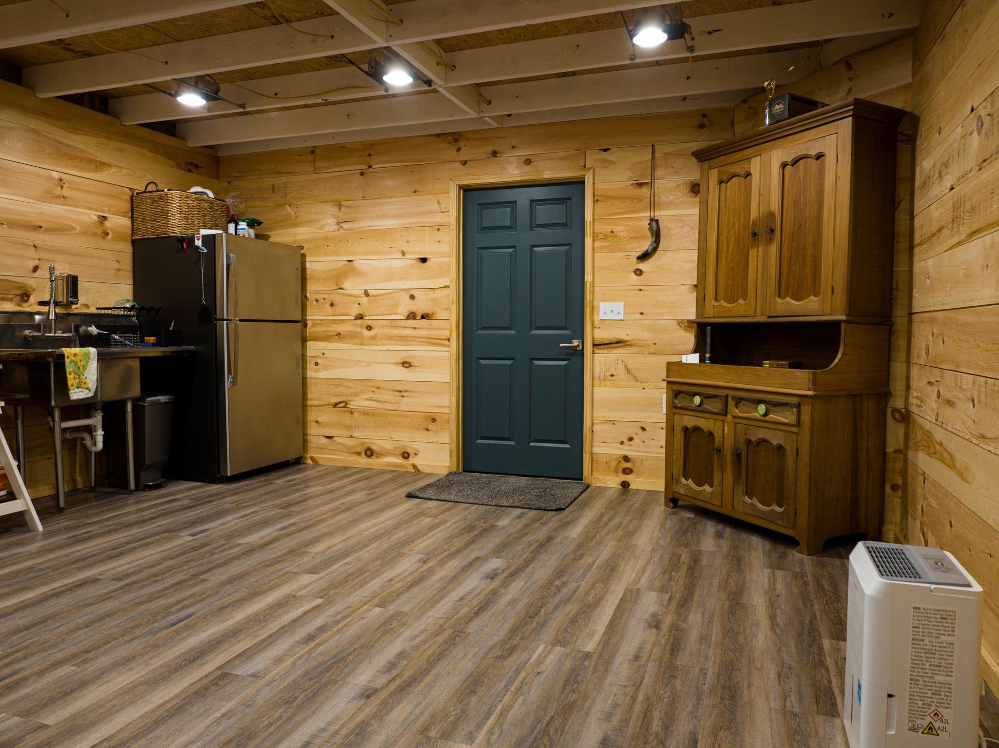2933 Cavia Road Holladay, TN 38341 - Photo 6 of 40 a view of a refrigerator in kitchen and car