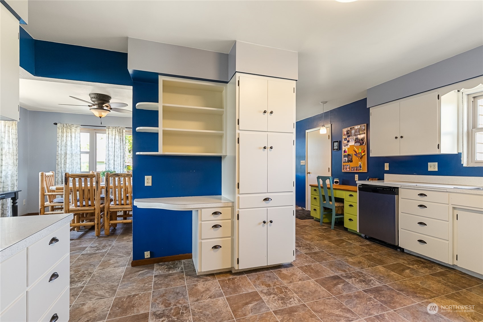 1520 East Badger Road Lynden, WA 98264 - Photo 12 of 36 a kitchen with a stove and cabinets