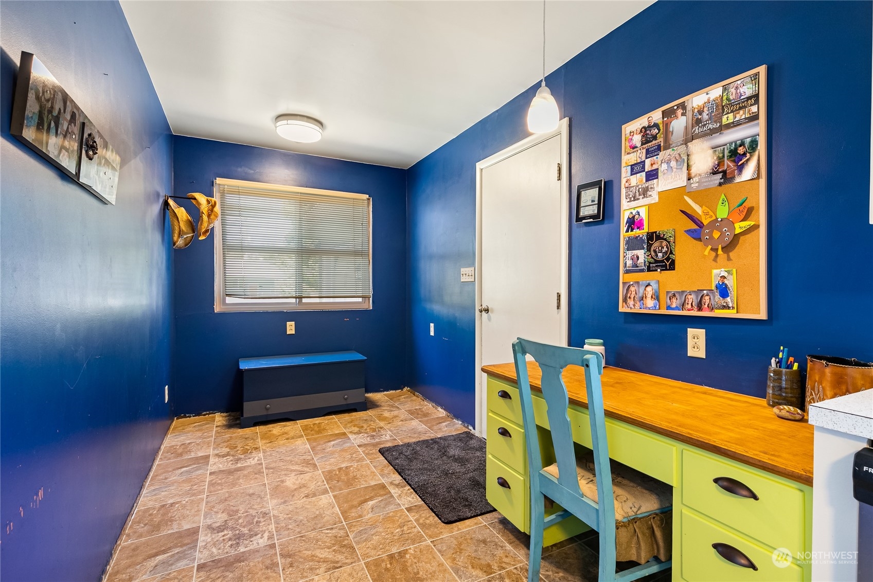 1520 East Badger Road Lynden, WA 98264 - Photo 13 of 36 a bedroom with a bed and painting on the wall