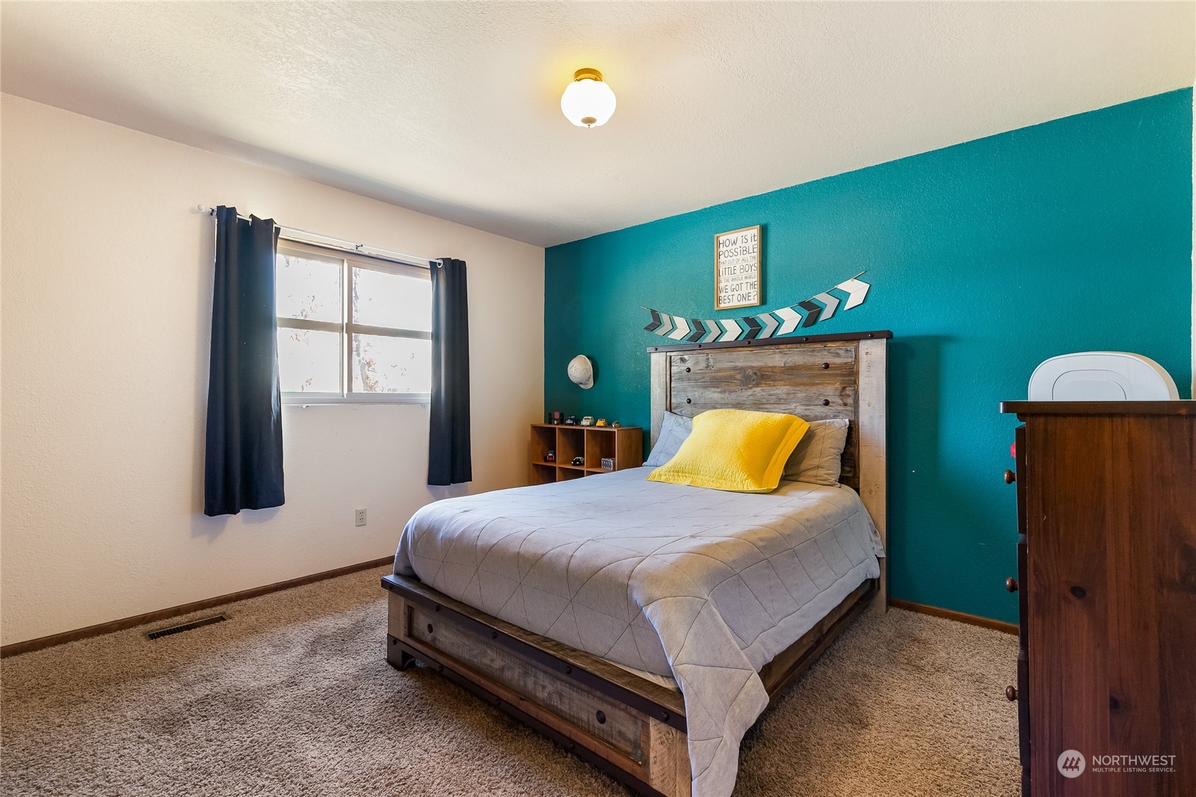 1520 East Badger Road Lynden, WA 98264 - Photo 18 of 36 a bedroom with a bed and a window