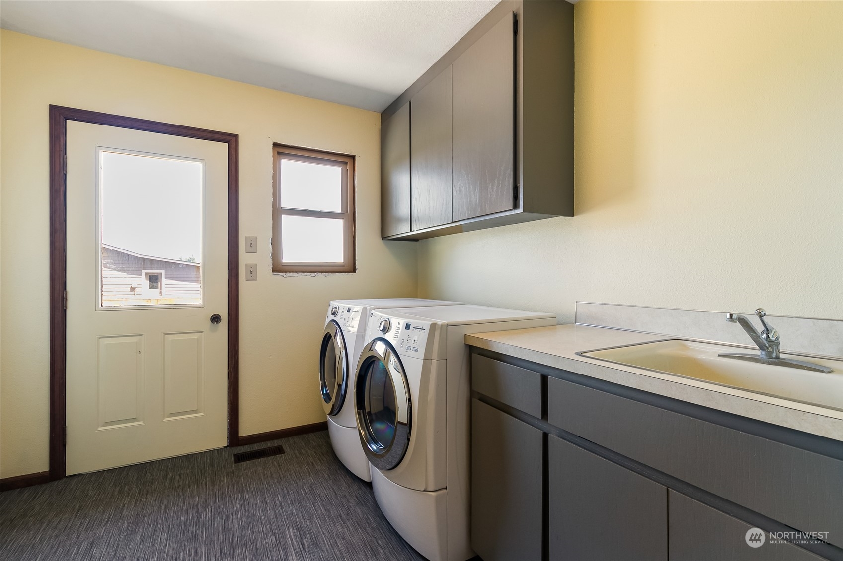 1520 East Badger Road Lynden, WA 98264 - Photo 22 of 36 a utility room with sink dryer and washer