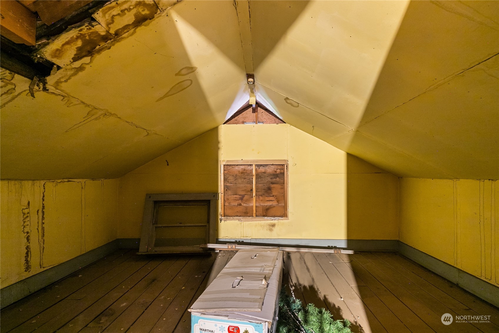 1520 East Badger Road Lynden, WA 98264 - Photo 23 of 36 a view of an empty room with a fireplace and wooden floor