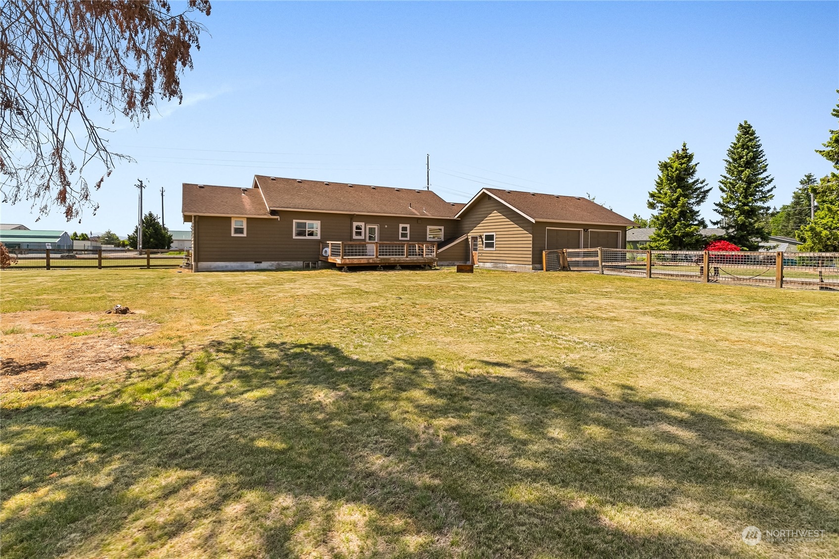 1520 East Badger Road Lynden, WA 98264 - Photo 27 of 36 a big house with a big yard and large trees