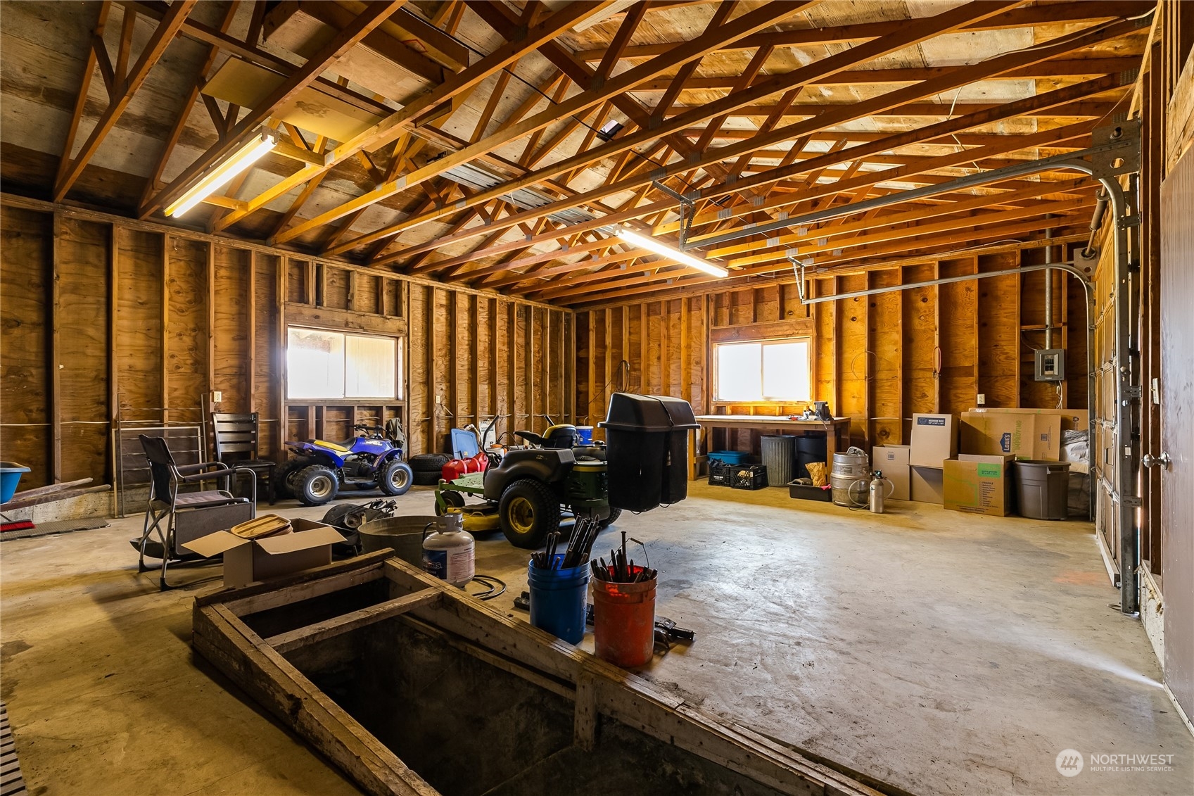 1520 East Badger Road Lynden, WA 98264 - Photo 32 of 36 a room with gym equipment and furniture