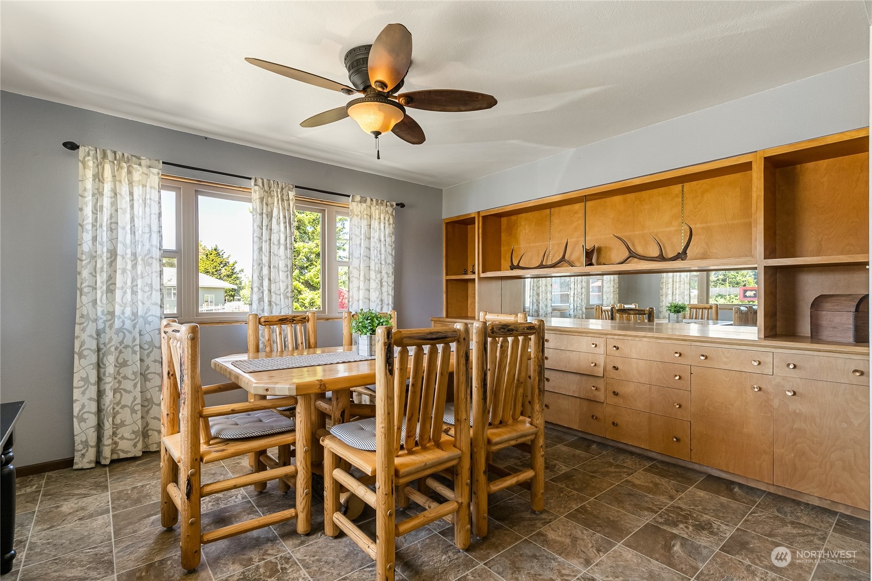1520 East Badger Road Lynden, WA 98264 - Photo 9 of 36 a view of a dining room with furniture window and outside view