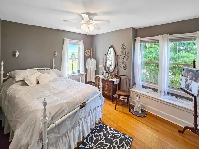 a bed room with a bed and a large dresser