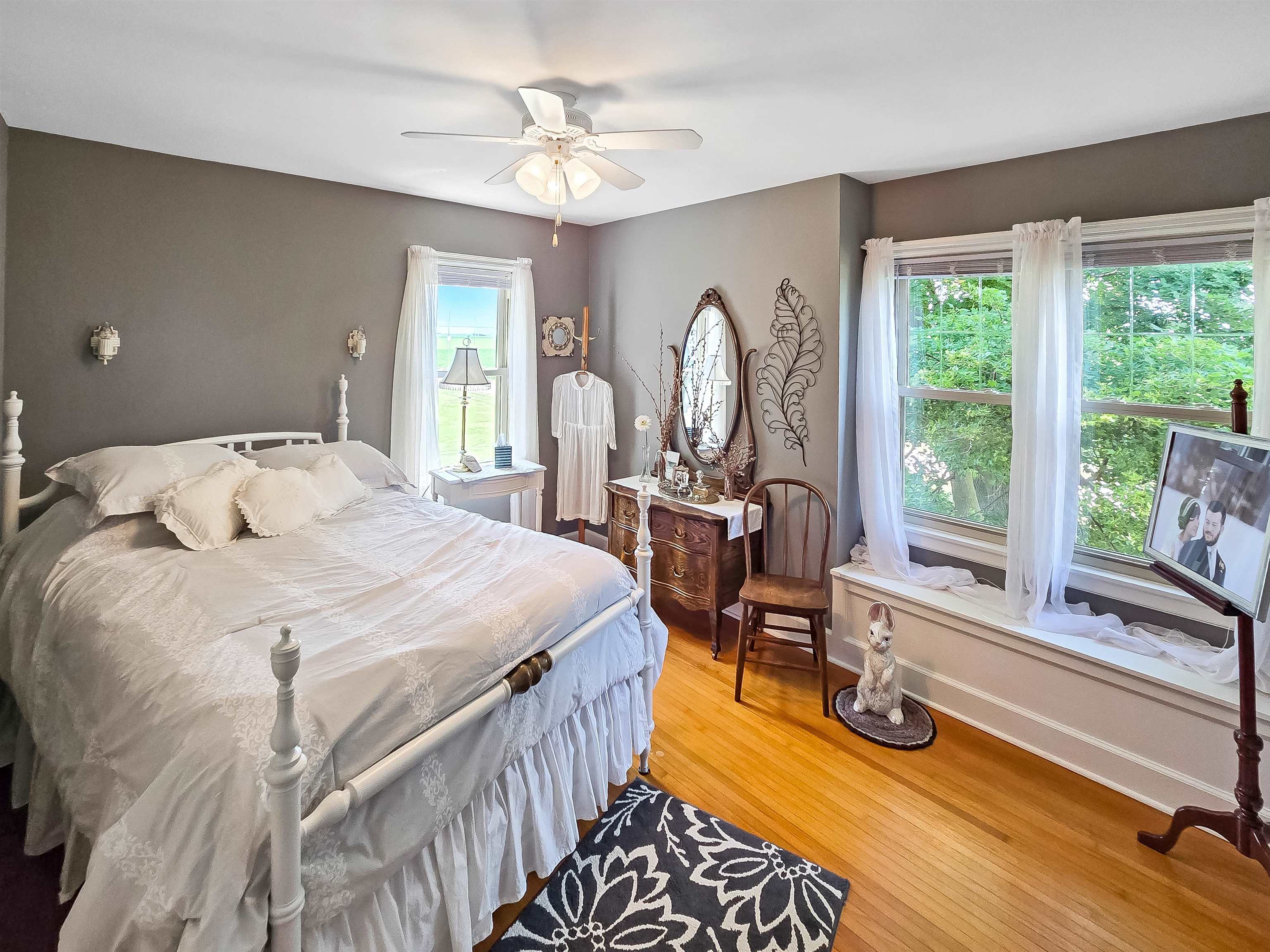 10225 North Brookville Road Shannon, IL 61078 - Photo 17 of 65 a bedroom with furniture and a window