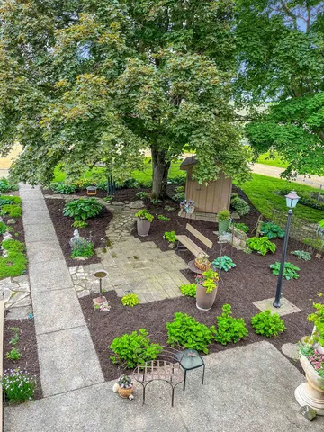 a view of a terrace with wooden fence