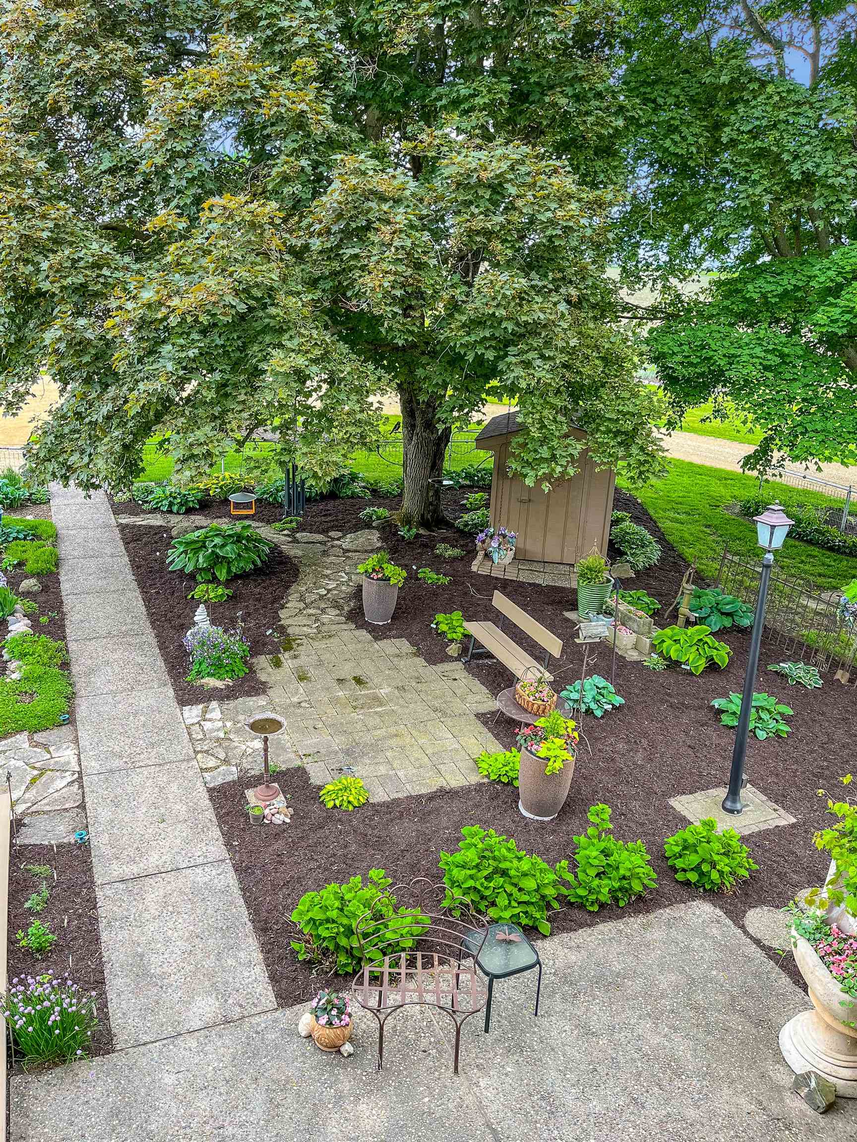 10225 North Brookville Road Shannon, IL 61078 - Photo 31 of 65 a backyard of a house with a yard and outdoor seating
