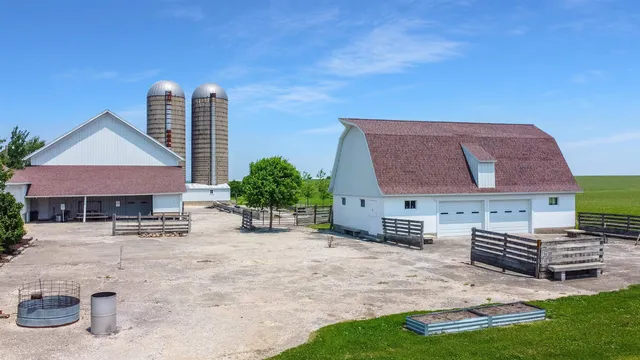 a view of a swimming pool with a yard