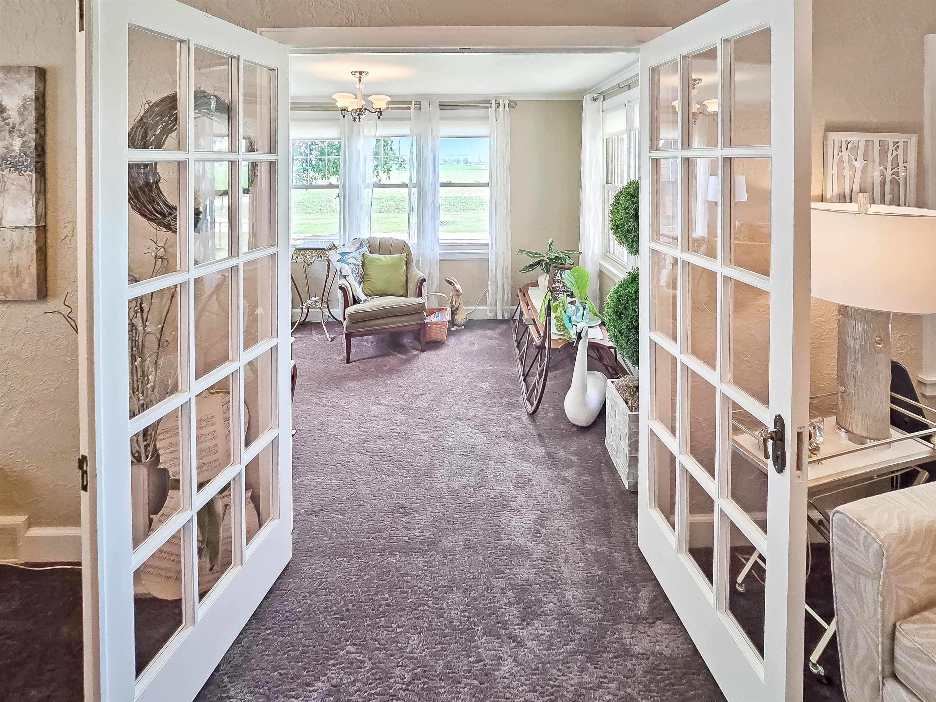 10225 North Brookville Road Shannon, IL 61078 - Photo 5 of 65 a view of an entryway with wooden floor and windows